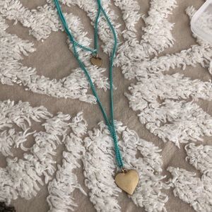 🔴 5/$5 Long teal necklace with gold hearts.